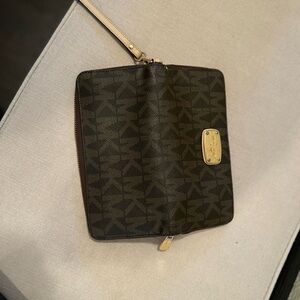 Michael Kors Black Wallet with Gold Hardware and Textured Design